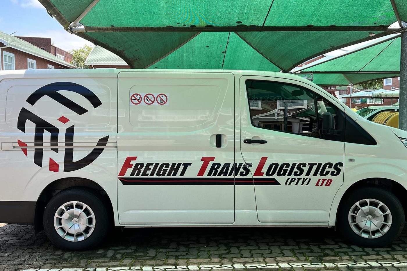 Freight Trans Logistics branded panel van used for lighter distribution work
